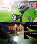Outdoor Solar Lights 2 In 1 Waterproof Spotlights With Auto On Off And Adjustable Landscape Lighting For Yard Garden Pathway 4 Pack Cool White High And Low Brightness Up To 200 Lumens displayed in yard and house at night.