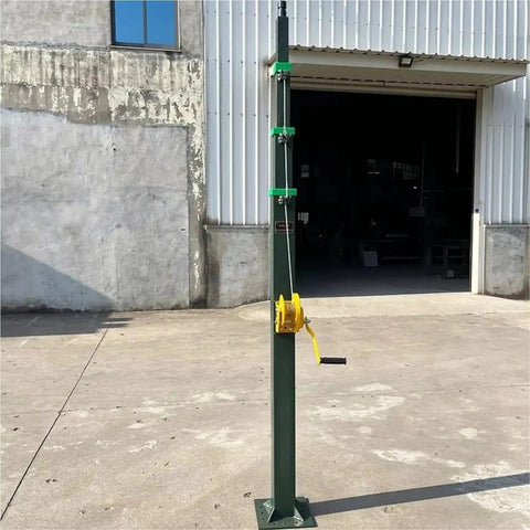 Rock Solid 6M Square Steel Hand Crank Telescopic Antenna Mast Satellite Stick standing outside for remote signal boosting.