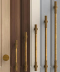 Top Shelf Antique Brass Cabinet Knobs And Drawer Pulls 10 Pack Heavy Duty Solid Metal Handles on various colored cabinets.