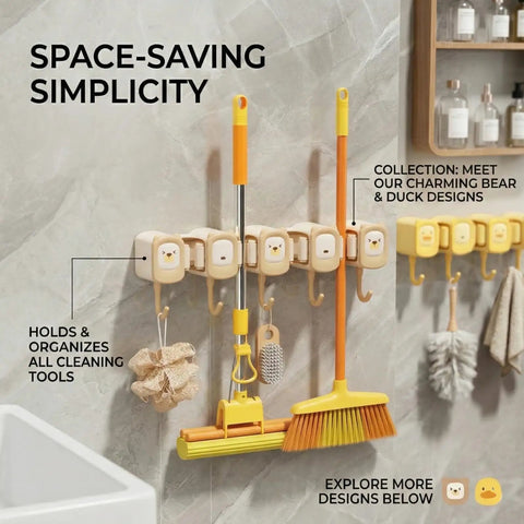 Broom Holder Wall Mount Self Adhesive Mop And Broom Organizer With 4 Grippers And 5 Hooks holding cleaning tools on wall.