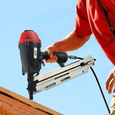 Using a Three In One Air Framing Nailer With Adjustable Magazine For Twenty One, Twenty Eight, Thirty Four Degree Nails on wood