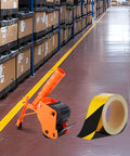 Heavy Duty Floor Tape Applicator For Driveways And Warehouses With Manual Push Marking Tool Non Slip Grip Adjustable Pressure Reusable Tape Roller Workhorse Includes Three Refill Rolls For Aisles And Sports Courts, orange ABS floor tape applicator with roll on warehouse aisle