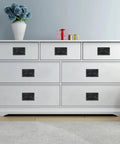 White dresser with Recessed Flush Pull Handles 4.37 Inch Set Of 2 in zinc alloy black finish, featuring spring actuated mechanism.