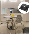 Rock Solid Table Leg Fixator Plates For Killing Wobbly Furniture Heavy Duty Black Steel Mounting Brackets on a dining table.