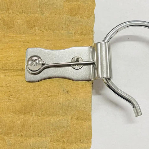 Heavy Duty Zig Zag Spring Repair Kit For Couches Chairs And Beds With Sturdy Iron Brackets close-up of a metal clip on wood
