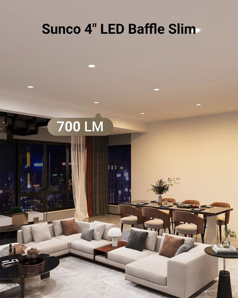 Pack Of Twelve 4 Inch Slim Canless Led Recessed Lights With Selectable 5Cct Dials seamlessly installed in modern living room ceiling.
