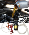 Heavy Duty 12V Self Priming Transfer Oil Pump For Garage And Shop Fluid Extractor with wires and oil being poured.