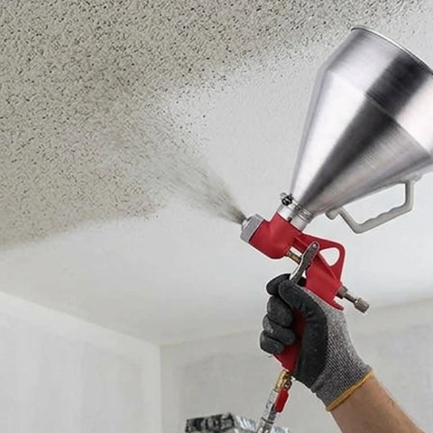User operating Pro Level Air Spray Gun Kit with smooth atomization for texture rollout on a ceiling.