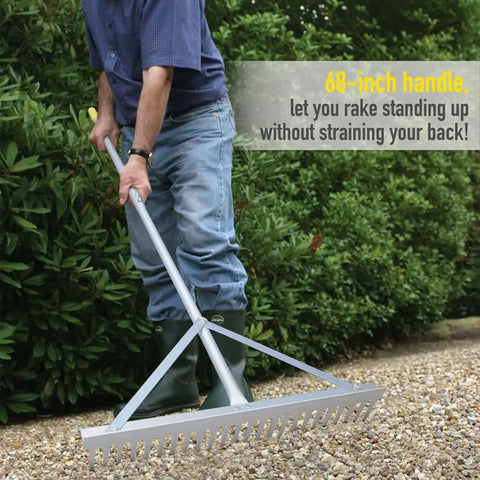 Person using landscape rake with aluminum head and 68 inch handle, 24 inch width with 24 tines, smoothing gravel on driveway
