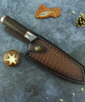 Beast Mode 7 Inch Meat Cleaver with 5Cr15Mov Blade in Durable Sheath on textured background, perfect for kitchen prep