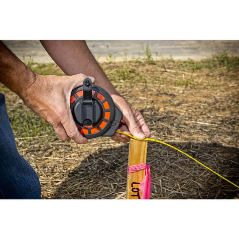 Three Eighths Inch By Fifty Foot Steel Construction Long Tape Measure With Three To One Gear used at a construction site