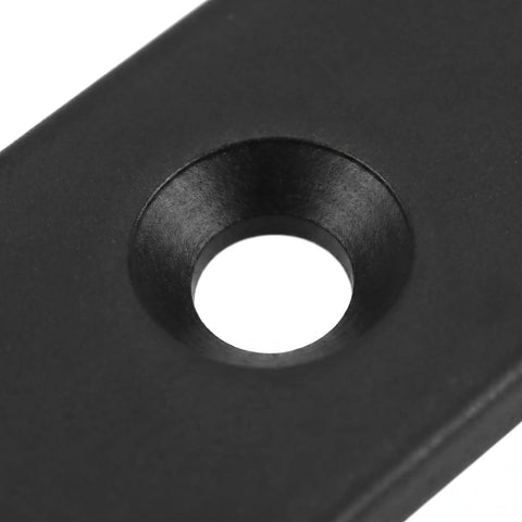 Close-up of black stainless steel bracket from 30 Pack Black Stainless Steel Flat Brackets With Screws For Bed Frames Furniture And Shelves Ready For Diy Repairs Pro Grade Strong Corner Joints Durable Wear Resistant Mending Plates For Home Improvement Projects
