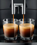 Grab This Slick Automatic Coffee Maker For Cranking Out Seventeen Specialty Brews And Custom Strength Settings Perfect For Handling The Daily Grind At Home Or Work, pouring espresso into two glasses.