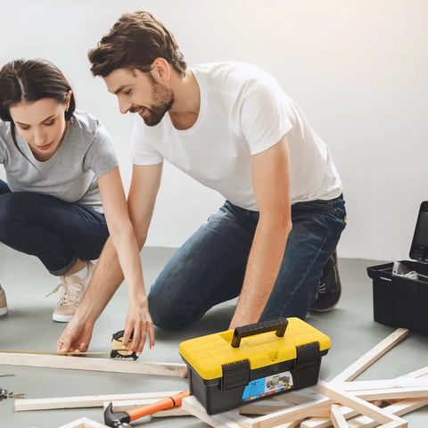 Heavy Duty Plastic Handheld Toolbox With Splashproof Compact Build, Rugged Electrician Storage Case on floor with DIYers.