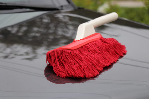 Red All In One Car Duster Detailing Kit with Plastic Handle on car hood for quick dust removal without scratching Model 62445