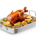 15.6 Inch Nonstick Stainless Steel Roasting Pan With V Shaped Rack holding roast chicken and vegetables