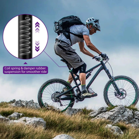 Cyclist riding mountain bike with Bike Suspension Seatpost 30.9x350mm Shock Absorber Damper on rocky trail