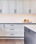 Modern kitchen with Matte Black and Gold Cabinet Pulls for Kitchen and Bathroom, 5 Inch Center to Center 128mm, 10 Pack on drawers