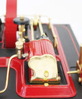 Close-up of classic D21 Steam Engine Model with Esbit Dry Fuel Burner TÜV Certified 120mm Burner, showcasing metallic design.
