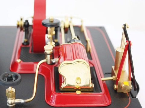 Close-up of classic D21 Steam Engine Model with Esbit Dry Fuel Burner TÜV Certified 120mm Burner, showcasing metallic design.