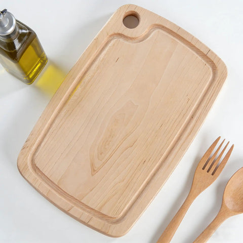 Premium Acrylic Two In One Cutting Board Router Template For Woodworking And Inlay Projects Laser Cut Quarter Inch Thick Guide, viewed from above with olive oil and utensils.