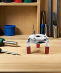 Heavy Duty Smoke Transducer Removal Tool Featuring A Slick Stainless Steel Head For Dead Reliable Fire System Maintenance And Smooth Professional Upgrades on a workbench.