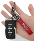 Red Leather Key Chain For Ram 1500 With 360 Degree Rotating Ring And Anti Lost D Ring held in hand, showing durable car key fob holder