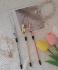 Three Piece Bracelet Helper Tool Set For Easy Necklace And Watch Clasps Zippers And Craft Adjustments In Gold Silver And Rose Gold Finishes Handy At Home Jewelry Fix Kit with three tools on fabric