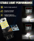 Premium 3157 Led Light Bulbs White Super Bright Tail Brake Reverse And Turn Signal Pair showing IC and high brightness performance.
