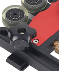 Close-up of Solid As A Rock Table Saw Featherboard showing grippy polyurethane rollers and adjustment knob for precision woodworking.