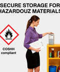 Heavy Duty Flammable Storage Cabinet In Galvanized Steel With Adjustable Shelves, woman organizing hazardous materials