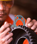 Technician using Outside Micrometer Set 0 To 4 Inches Pro Grade Machinist Tool Kit With Carbide Tipped Measuring Heads on gear.