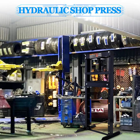 Heavy Duty 20 Ton Hydraulic Shop Press With Adjustable H Frame And Steel Press Plates floor mounted in a busy garage.