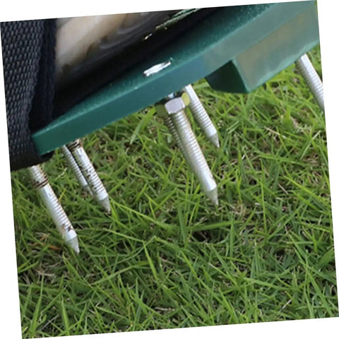 Close-up of 40 Pcs Metal Aerator Shoes Spikes for Lawn and Grass, showing metal spikes penetrating green lawn.