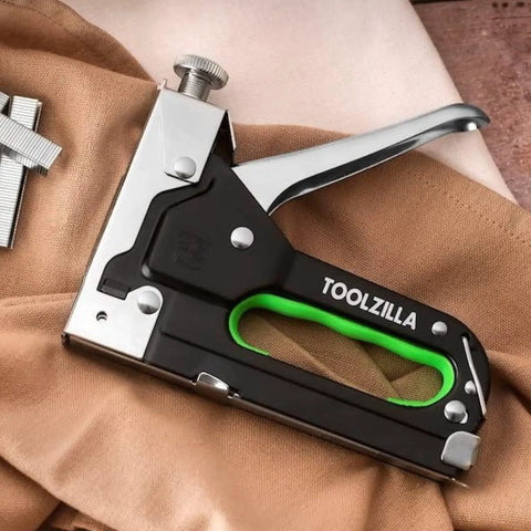 Heavy Duty Staple Gun Kit With Staples Pack For Fabric, Cable, And Wood Projects on fabric surface