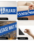 Five Piece Please Wait Here Floor Sign Kit 26 By 6 Inches Self Adhesive Waterproof Vinyl, Durable Social Distancing Markers For Queues And Waiting Areas, Multipack Signage For Busy Shops.