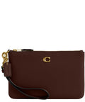 Top Shelf Small Wristlet Crafted From Smooth Pebble Leather With Signature Hardware And Detachable Strap For Phone Cash Cards Everyday Carry Clean Fit Women Fashion Clutch Case in dark brown color with wrist strap