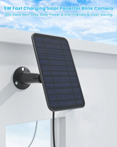 Premium 5 Watt Solar Panel Set To Keep Outdoor Cameras Never Running Dry Featuring Hefty IP65 Rain Proof Housing and extended wiring mounted on a wall.