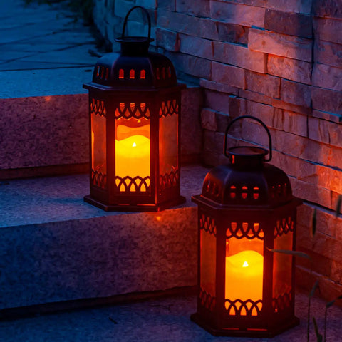 Two Pack Bronze Solar Lanterns With Ornate Retro Hanging Design illuminating steps at night