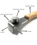 Close-up of Multifunction Hive Scraper Tool with wooden handle, detachable hammer, and stainless steel construction.