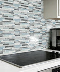 Self Adhesive Kitchen Backsplash Tiles With Marble Look For Quick Kitchen Remodel Peel And Stick 12 By 12 Inch Sheets Ten Tiles No Grout Needed Easy Install 40 Percent More Coverage Durable Cleanable Marble Finish shown on kitchen wall behind stove.