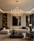 Gold Finish K9 Crystal Chandelier With 6 Lights, French Classic Style Ceiling Fixture above modern living room setting.