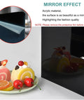 Black acrylic Disposable Coffee Cup Dispenser Organizer with mirror surface, reflecting desserts, for easy access in coffee shop settings.