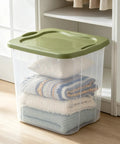 Hella Huge 95 Quart Clear Plastic Storage Bin With Super Grippy Handles for storing blankets and pillows in a tidy closet.