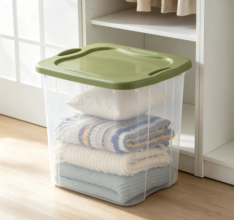Hella Huge 95 Quart Clear Plastic Storage Bin With Super Grippy Handles for storing blankets and pillows in a tidy closet.