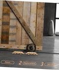 Heavy Duty Barn Door Roller Kit Includes Two Rock Solid Aluminum Sliding Pulley Wheels on a wooden barn door.
