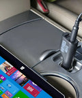 No Drama 36W Car Charger For Microsoft Surface Pro And Laptop Fast Charging Adapter plugged into a vehicle socket with Surface Pro.
