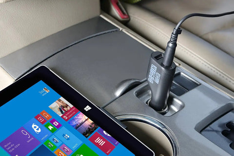 No Drama 36W Car Charger For Microsoft Surface Pro And Laptop Fast Charging Adapter plugged into a vehicle socket with Surface Pro.