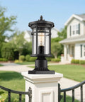 Outdoor Post Light For Garden And Pathway Vintage Exterior Pillar Lamp on white pedestal with warm glow