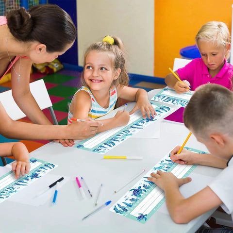 Children using 60 Pack Ocean Themed Sea Animal Name Tag Stickers For Back To School Marine Life Adhesive Labels in classroom.
